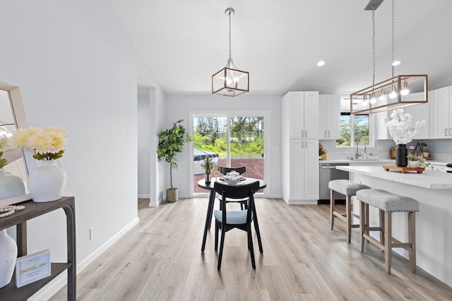 15-1754 Paradise Dr, Keaau, HI 96749 - dining area with a chandelier, light wood-type flooring, recessed lighting, and baseboards