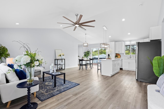 15-1754 Paradise Dr, Keaau, HI 96749 - living area featuring a ceiling fan, vaulted ceiling, light wood finished floors, and recessed lighting