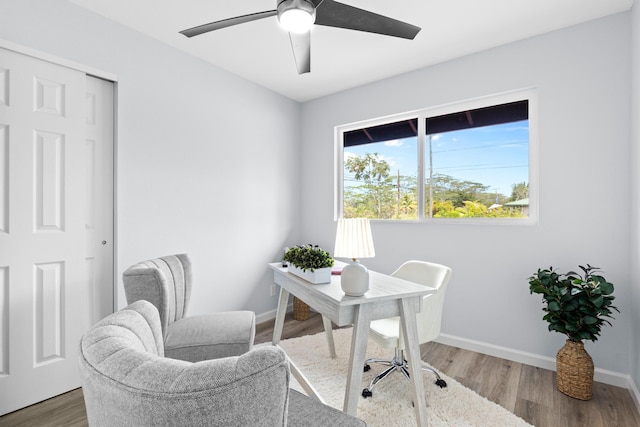 15-1754 Paradise Dr, Keaau, HI 96749 - home office with a ceiling fan, wood finished floors, and baseboards