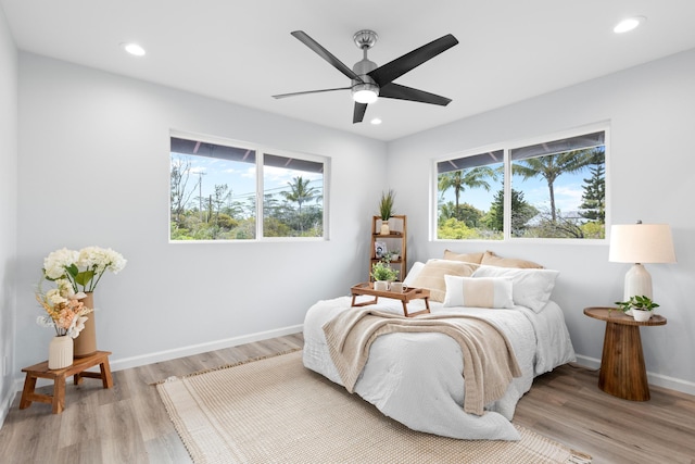 15-1754 Paradise Dr, Keaau, HI 96749 - bedroom featuring light wood-type flooring, baseboards, recessed lighting, and ceiling fan