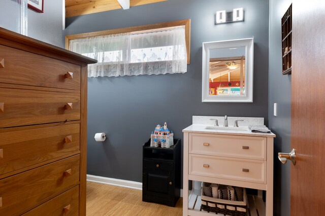 71-1769 Puu Lani Dr, Kailua-Kona, HI 96740 - bathroom with vanity, wood finished floors, and baseboards