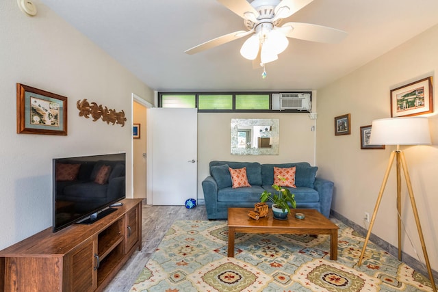 5301 Ka Haku Rd Unit 112, Princeville, HI 96722 - living room featuring a wall mounted AC, wood finished floors, and a ceiling fan
