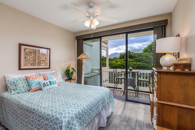 5301 Ka Haku Rd Unit 112, Princeville, HI 96722 - bedroom featuring access to outside, wood finished floors, and ceiling fan