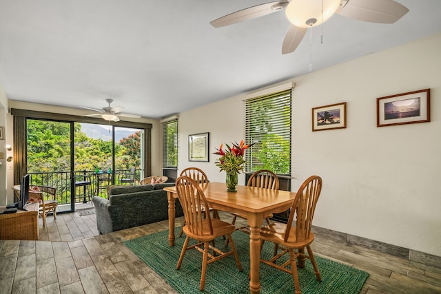 5301 Ka Haku Rd Unit 112, Princeville, HI 96722 - dining space with a ceiling fan and wood finished floors