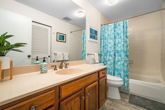 5301 Ka Haku Rd Unit 112, Princeville, HI 96722 - full bath with vanity, toilet, shower / tub combo, and wood finished floors