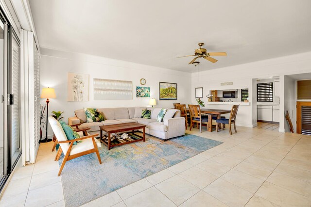 2253 Poipu Rd Unit 241, Koloa, HI 96756 - living area featuring light tile patterned flooring and a ceiling fan