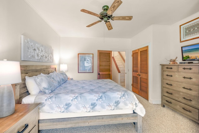 2253 Poipu Rd Unit 241, Koloa, HI 96756 - bedroom featuring light carpet, crown molding, and a ceiling fan