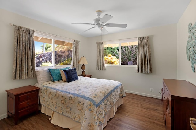 77-6596 Walua Rd, Kailua-Kona, HI 96740 - bedroom with baseboards, multiple windows, dark wood-style floors, and ceiling fan