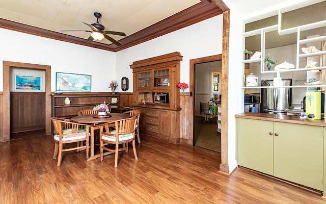 394 Haili St, Hilo, HI 96720 - dining area with crown molding, ceiling fan, and light wood-style floors