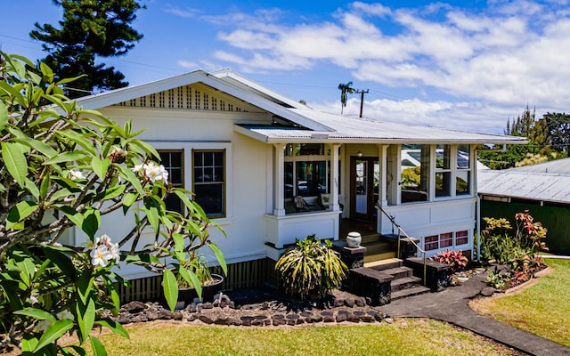 394 Haili St, Hilo, HI 96720 - bungalow featuring a sunroom and metal roof