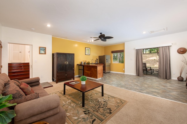 44-2325 Middle Rd, Honokaa, HI 96727 - living area featuring a ceiling fan, light tile patterned floors, light colored carpet, recessed lighting, and baseboards