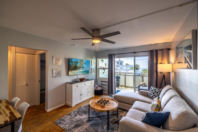 74-5618 Palani Rd Unit C7, Kailua-Kona, HI 96740 - living room with wood finished floors, ceiling fan, and baseboards