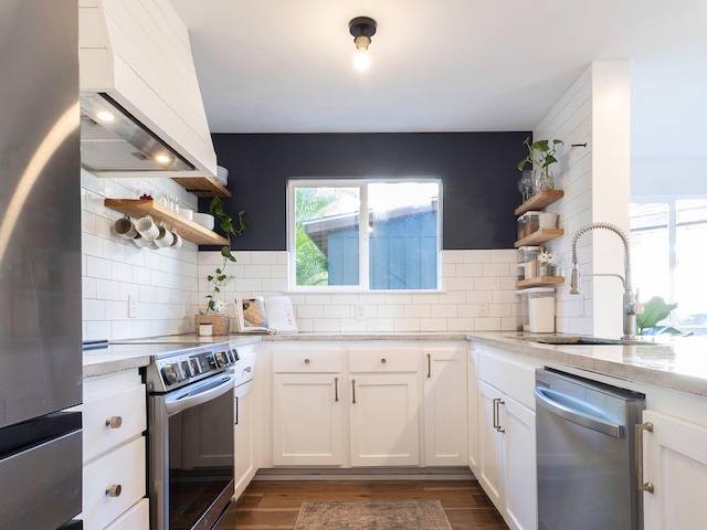 189 Poouli St, Wailuku, HI 96793 - kitchen with open shelves, appliances with stainless steel finishes, custom range hood, and light stone countertops