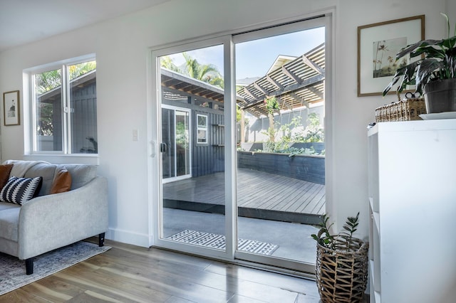 189 Poouli St, Wailuku, HI 96793 - doorway with wood finished floors and baseboards