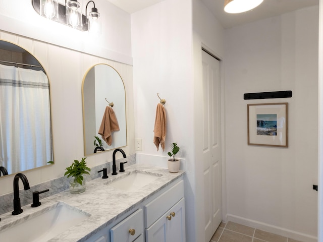 189 Poouli St, Wailuku, HI 96793 - full bathroom featuring double vanity, tile patterned flooring, and baseboards