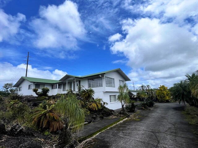 272 Lama St, Hilo, HI 96720 - view of front of house featuring stucco siding