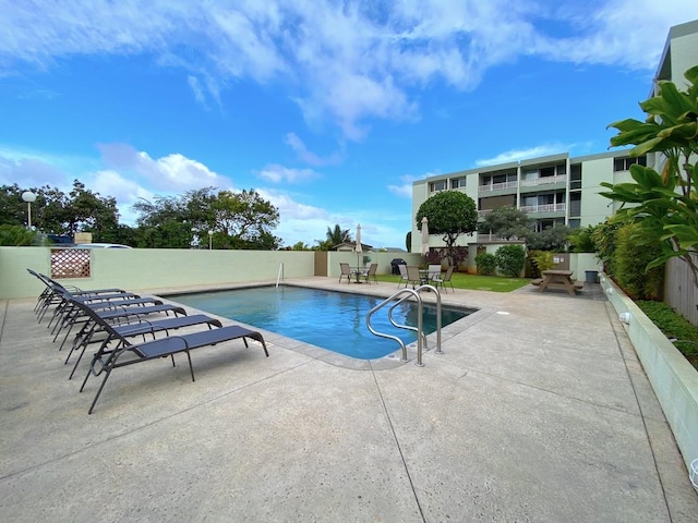 4156 Rice St Unit 404, Lihue, HI 96766 - view of pool featuring a patio and a fenced backyard