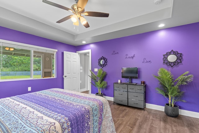 15-1884 14th Ave, Keaau, HI 96749 - bedroom featuring wood finished floors, ceiling fan, recessed lighting, baseboards, and a raised ceiling