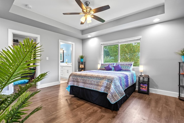 15-1884 14th Ave, Keaau, HI 96749 - bedroom with baseboards, wood finished floors, recessed lighting, ensuite bathroom, and a raised ceiling