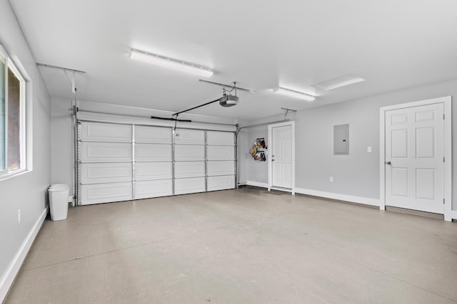 15-1884 14th Ave, Keaau, HI 96749 - garage with electric panel, a garage door opener, and baseboards