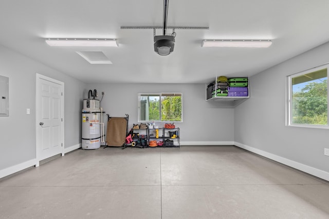 15-1884 14th Ave, Keaau, HI 96749 - garage with water heater, electric panel, a garage door opener, and baseboards