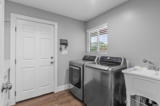15-1884 14th Ave, Keaau, HI 96749 - laundry room with washer and dryer and dark wood-type flooring