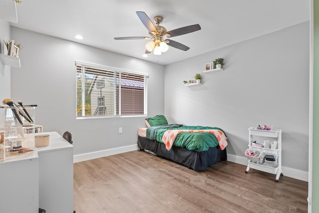 15-1884 14th Ave, Keaau, HI 96749 - bedroom featuring wood finished floors, baseboards, recessed lighting, and ceiling fan