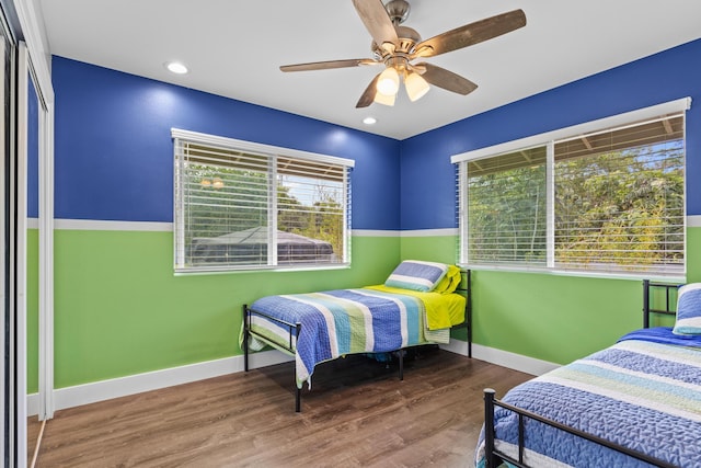 15-1884 14th Ave, Keaau, HI 96749 - bedroom featuring wood finished floors, a ceiling fan, and baseboards