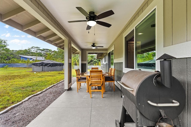 15-1884 14th Ave, Keaau, HI 96749 - view of patio / terrace with outdoor dining area, ceiling fan, and area for grilling