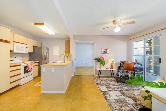 68-3890 Lua Kula St Unit 1601, Waikoloa, HI 96738 - kitchen with white appliances, a peninsula, a sink, light countertops, and light flooring