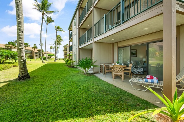 4-1250 Kuhio Hwy Unit H104, Kapaa, HI 96746 - view of grassy yard with a patio