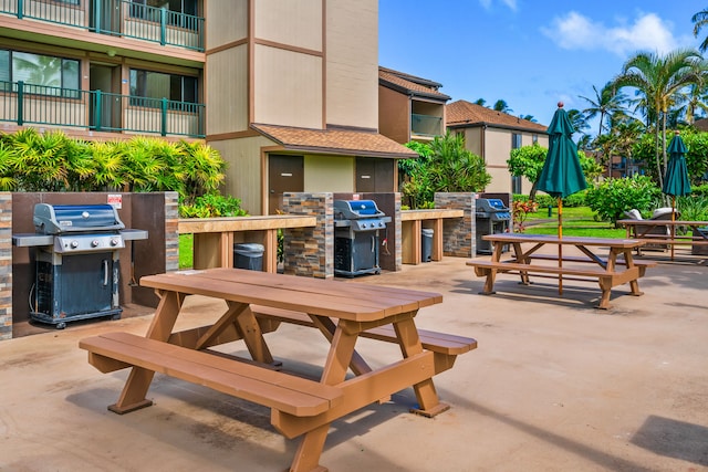 4-1250 Kuhio Hwy Unit H104, Kapaa, HI 96746 - view of patio / terrace featuring outdoor dining area and area for grilling
