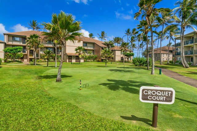 4-1250 Kuhio Hwy Unit H104, Kapaa, HI 96746 - view of property's community featuring a residential view and a yard