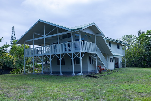 15-1517 7th Ave, Keaau, HI 96749 - back of property featuring stairway, a lawn, and a wooden deck