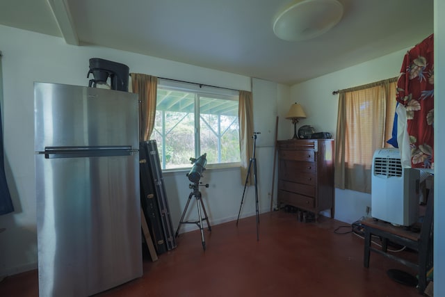 15-1517 7th Ave, Keaau, HI 96749 - interior space featuring freestanding refrigerator and concrete floors
