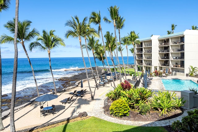 75-6106 Alii Dr Unit 208, Kailua-Kona, HI 96740 - community pool with view of water and beach and a patio