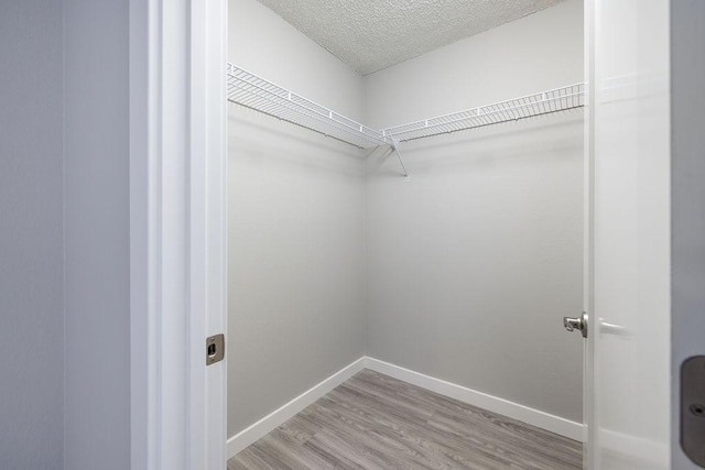 68-3890 Lua Kula St Unit 1104, Waikoloa, HI 96738 - spacious closet with wood finished floors