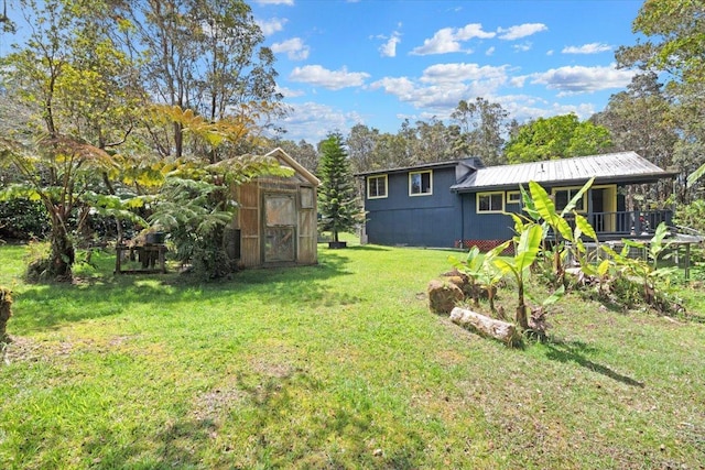 11-3953 Liona St, Volcano, HI 96785 - view of green lawn with an outdoor structure