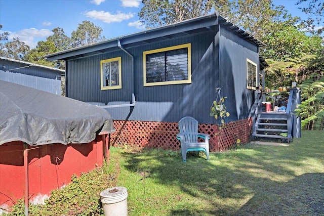 11-3953 Liona St, Volcano, HI 96785 - view of property exterior featuring a yard