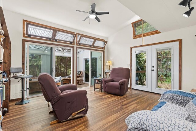 32-520 Piha Kahuku Rd, Ninole, HI 96773 - living area with french doors, wood finished floors, ceiling fan, and high vaulted ceiling