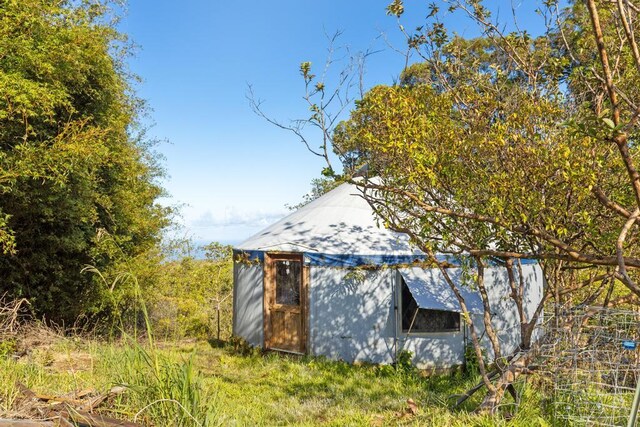 32-520 Piha Kahuku Rd, Ninole, HI 96773 - view of home's exterior with an outbuilding