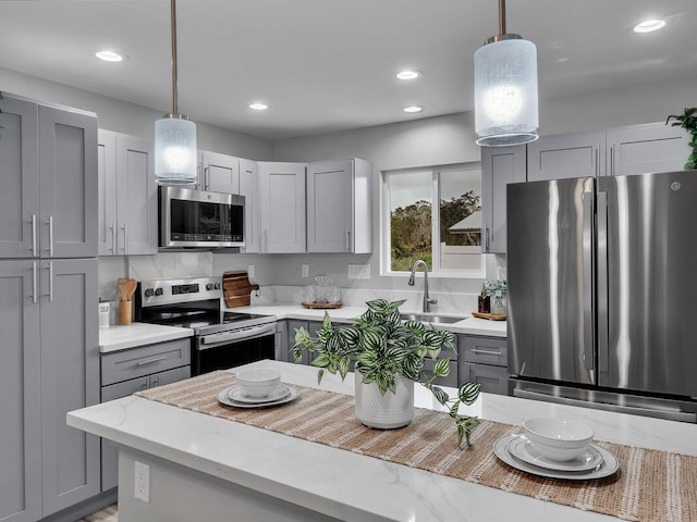 11-3063-A Puolani St, Volcano, HI 96785 - kitchen with appliances with stainless steel finishes, gray cabinetry, a sink, recessed lighting, and decorative light fixtures