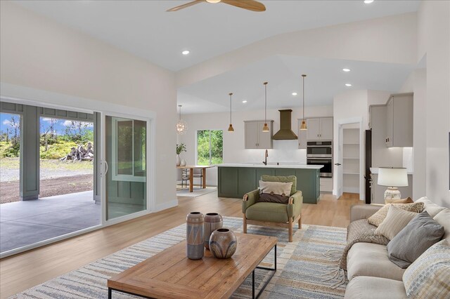 15-1616 7th Ave, Keaau, HI 96749 - living area with light wood-style floors, ceiling fan, recessed lighting, and high vaulted ceiling