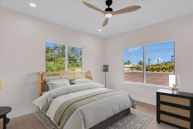 15-1616 7th Ave, Keaau, HI 96749 - bedroom with baseboards, light wood-style flooring, recessed lighting, and ceiling fan