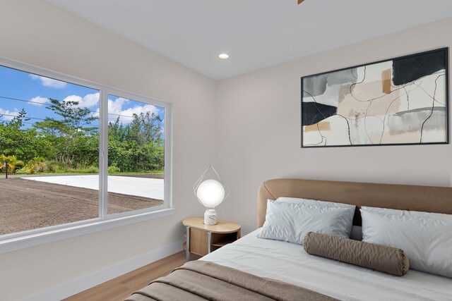 15-1616 7th Ave, Keaau, HI 96749 - bedroom with wood finished floors, baseboards, and recessed lighting