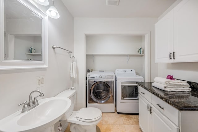 74-4999 Hao Kuni Pl, Kailua-Kona, HI 96740 - half bath with separate washer and dryer, a sink, tile patterned floors, and toilet