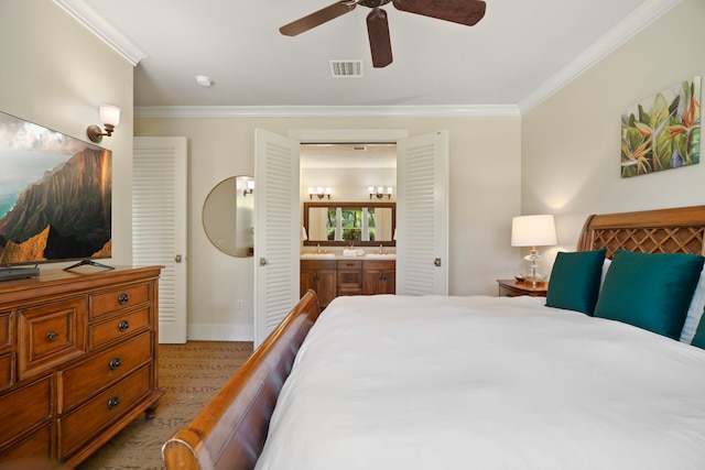 2373 Hoohu Rd Unit B111, Koloa, HI 96756 - bedroom featuring crown molding, ensuite bathroom, baseboards, and a ceiling fan