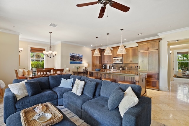 2373 Hoohu Rd Unit B111, Koloa, HI 96756 - living room with plenty of natural light, ceiling fan, a chandelier, recessed lighting, and ornamental molding