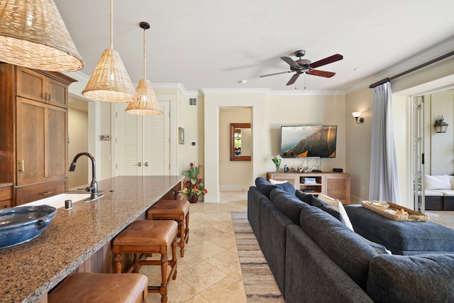 2373 Hoohu Rd Unit B111, Koloa, HI 96756 - living room featuring ceiling fan, crown molding, light tile patterned floors, and baseboards