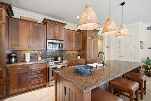 2373 Hoohu Rd Unit B111, Koloa, HI 96756 - kitchen with stainless steel appliances, a sink, ornamental molding, tasteful backsplash, and a kitchen breakfast bar